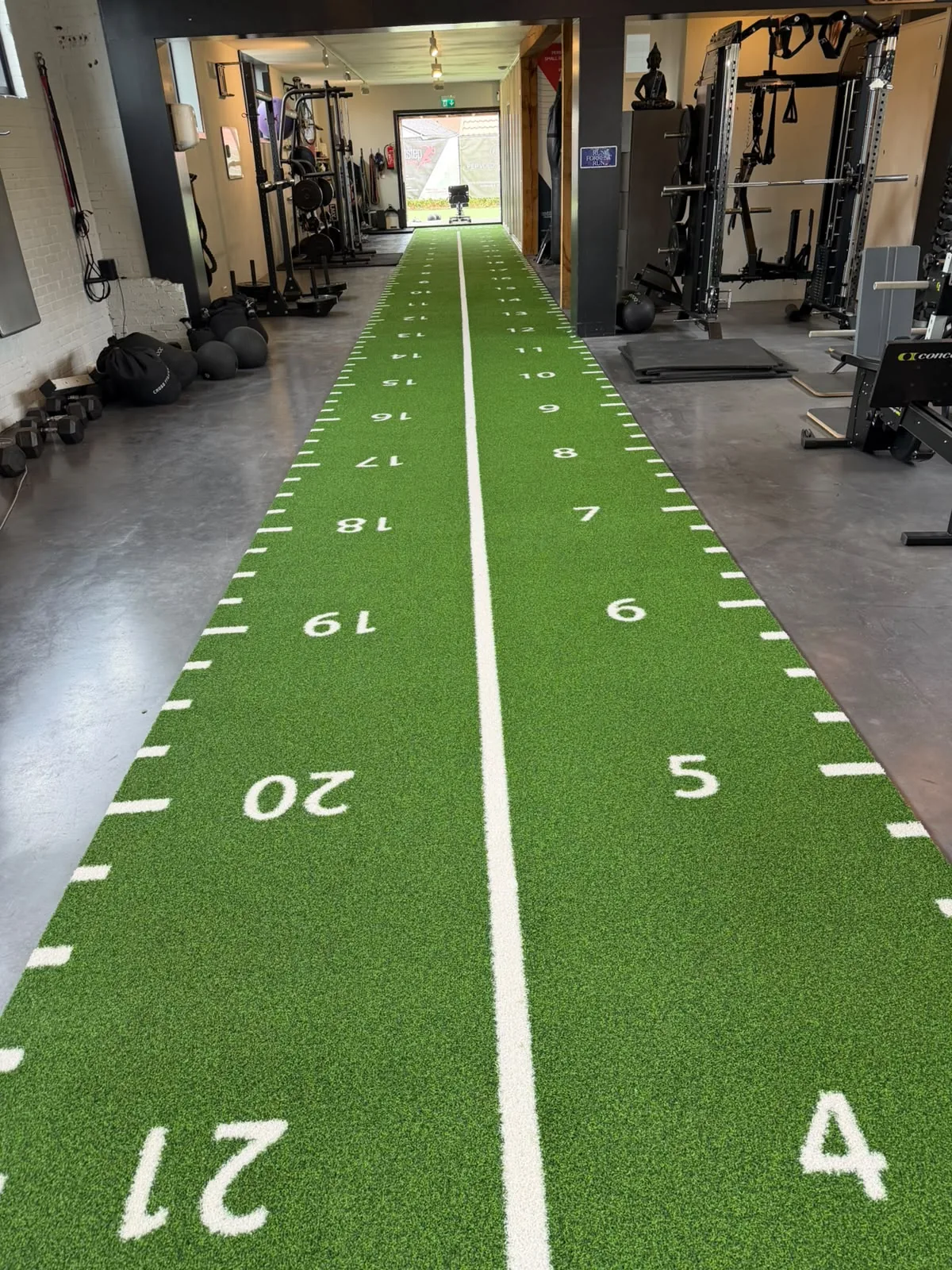 Customer-installed green sled track turf with two-direction numbers in the Netherlands